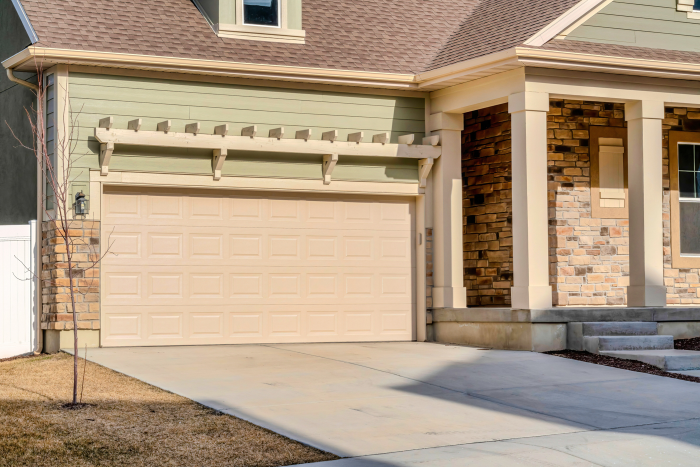 Modern smart garage door on Canadian home exterior