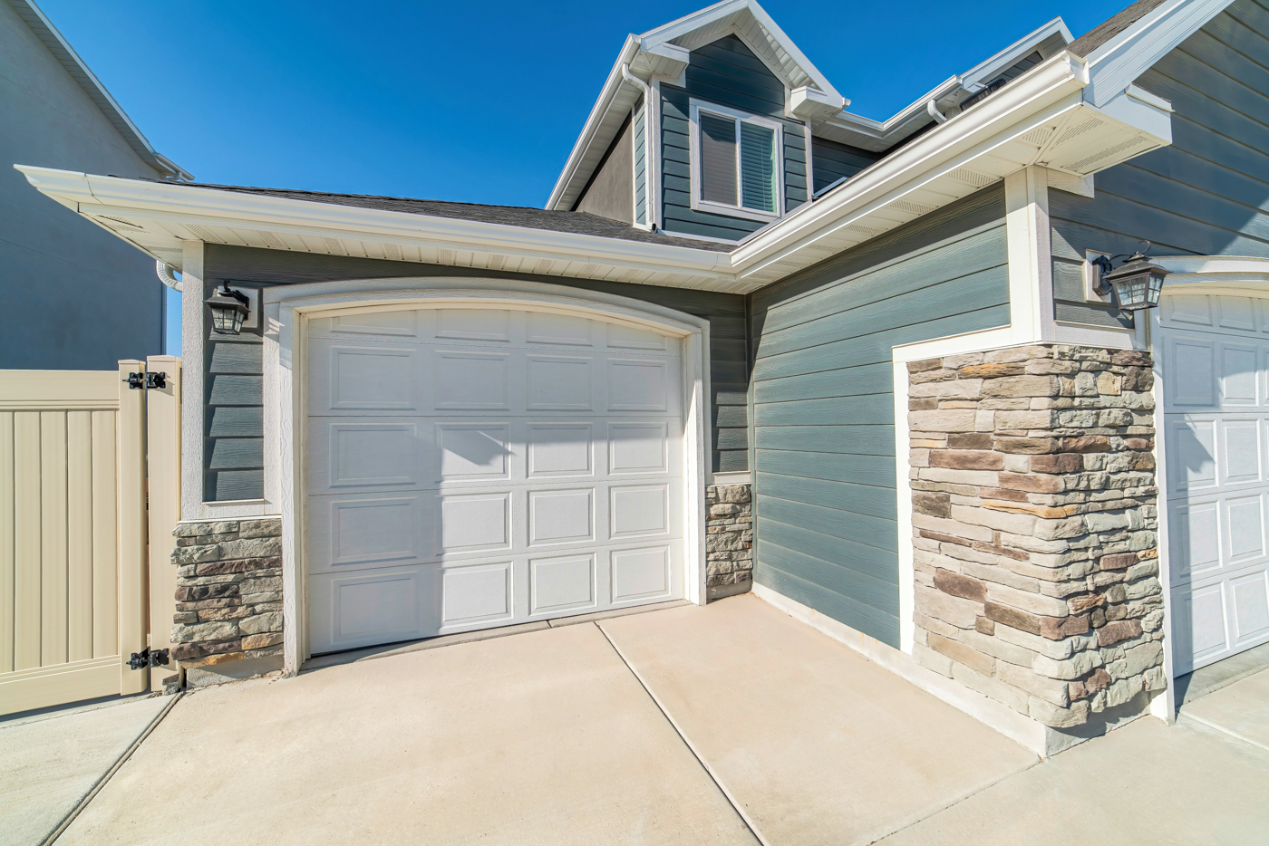 White residential garage door on Canadian home