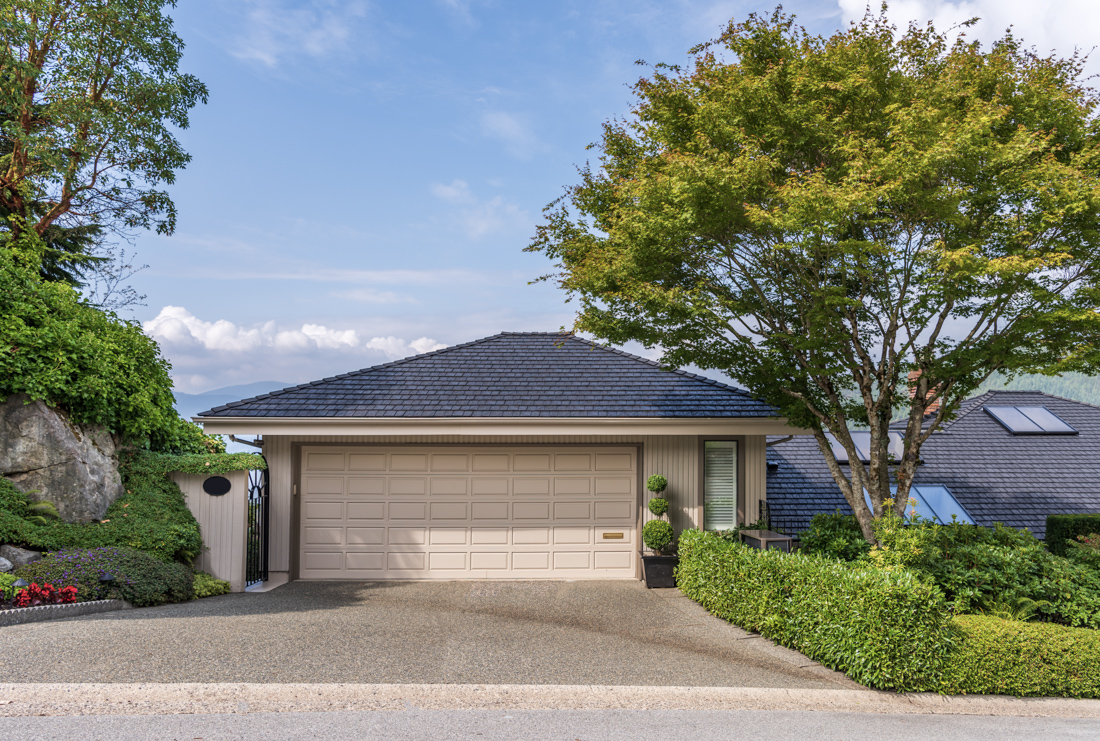 Modern double garage door on Canadian home exterior