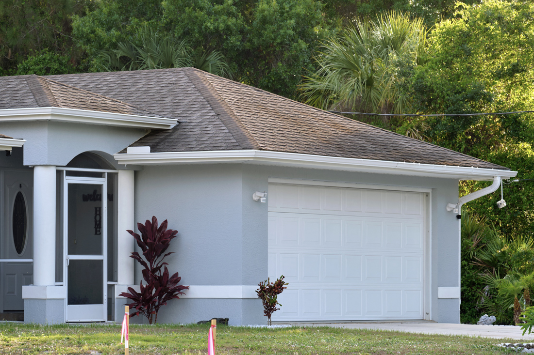 Modern residential garage doors on Canadian home exterior