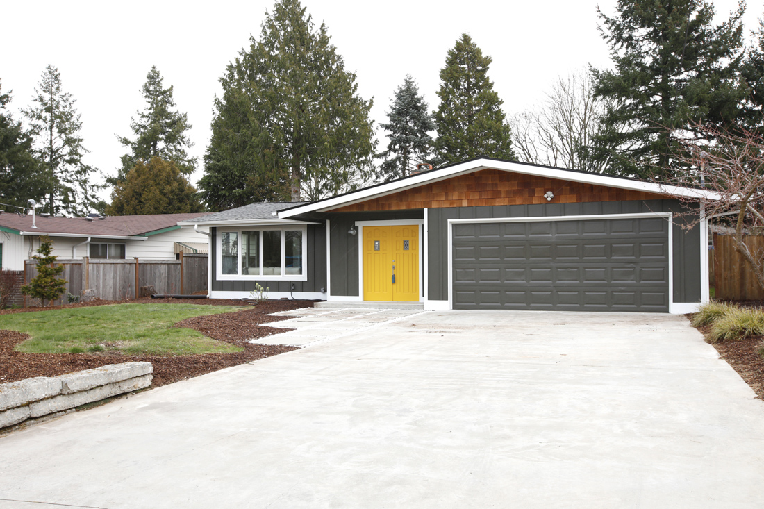 Modern residential garage door with weather sealing