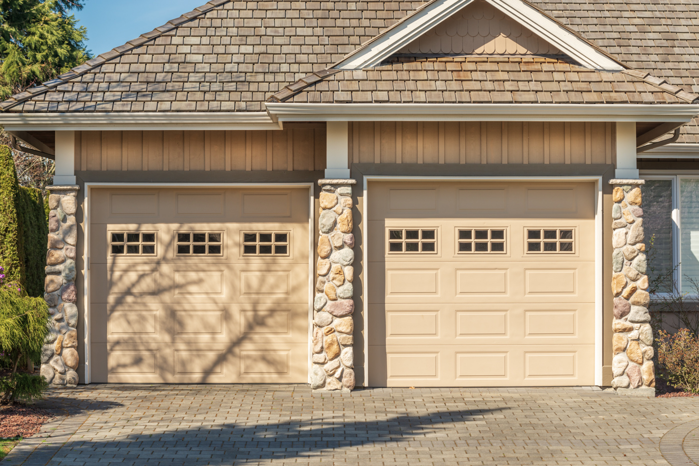 Modern residential garage with blue facade