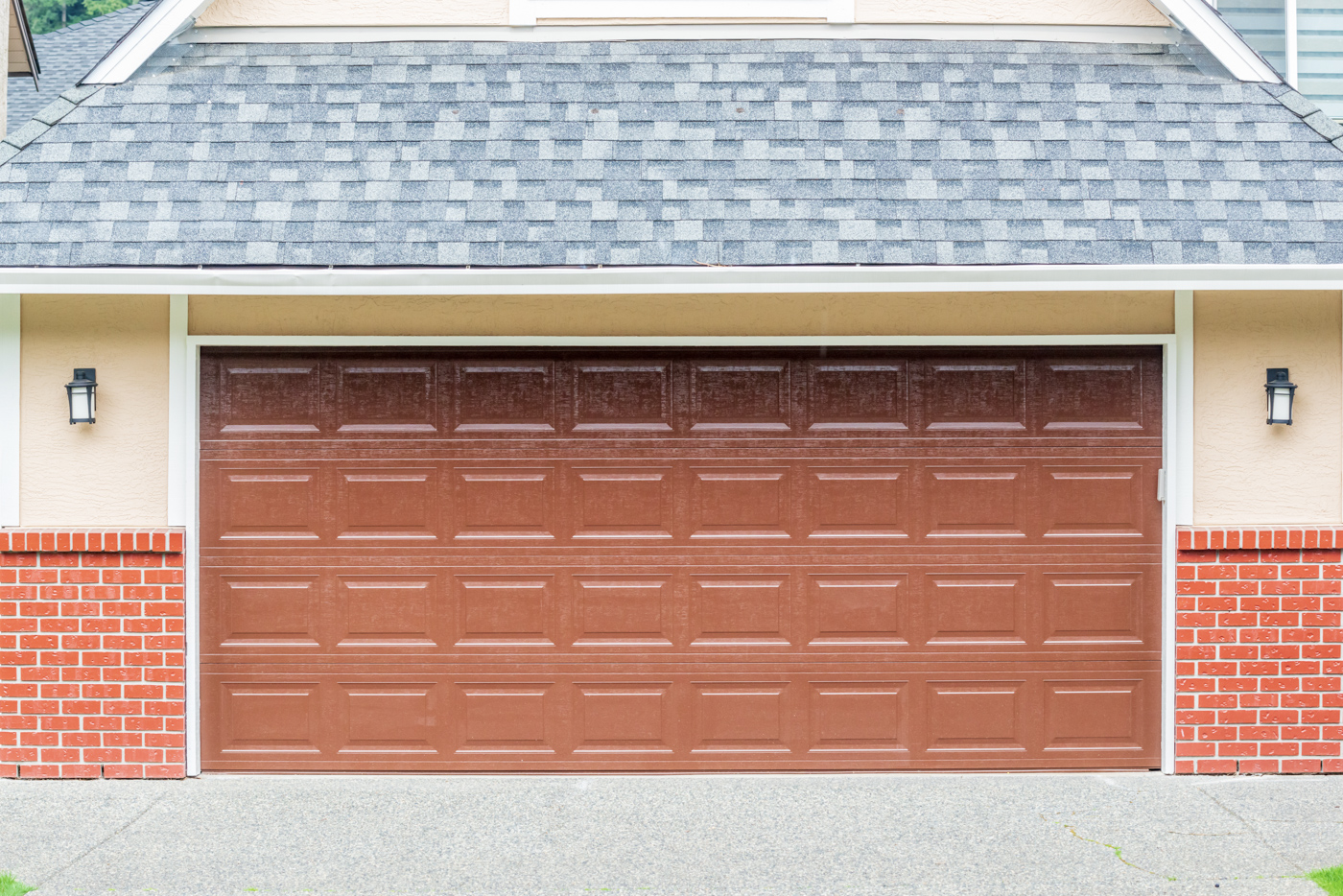 Modern residential home with grey garage door