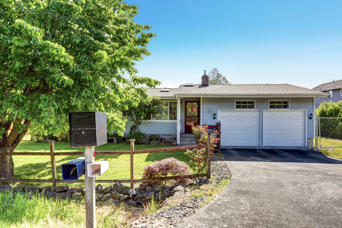 Modern residential home with garage door