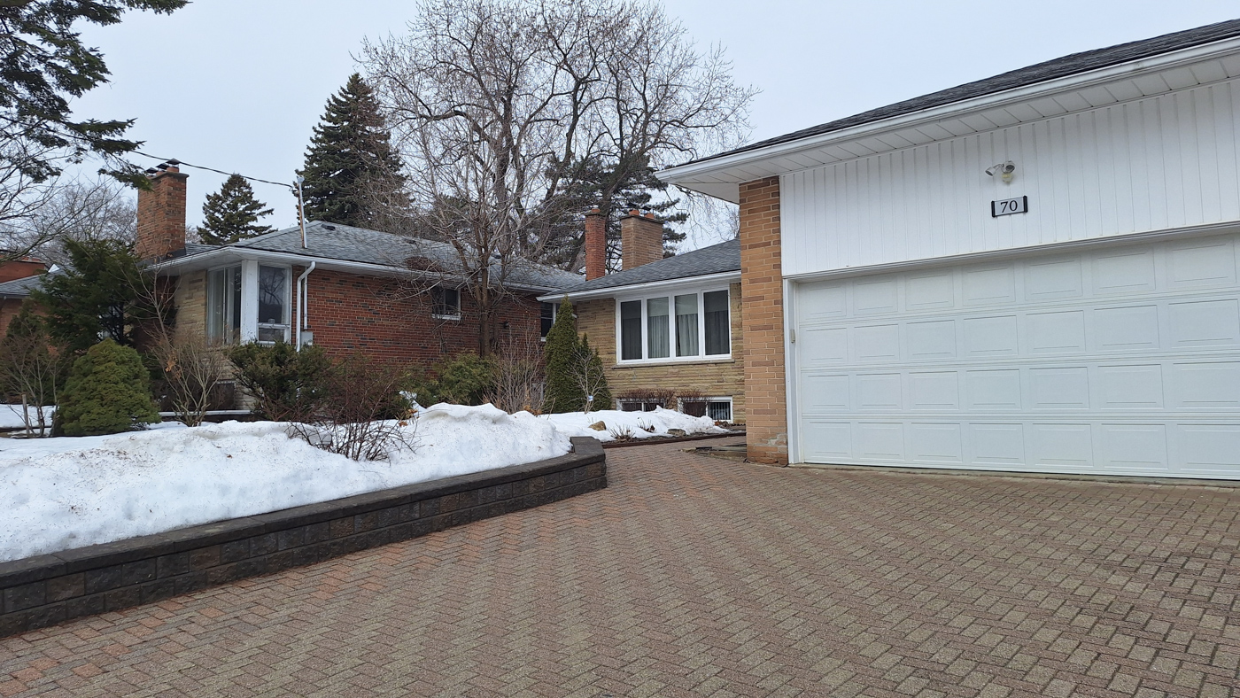 Residential garage door with window insert options